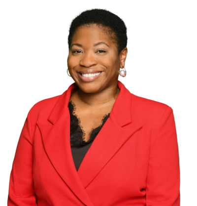 Photo of a woman with a red blazer and short dark hair. Reina Ntonifor  