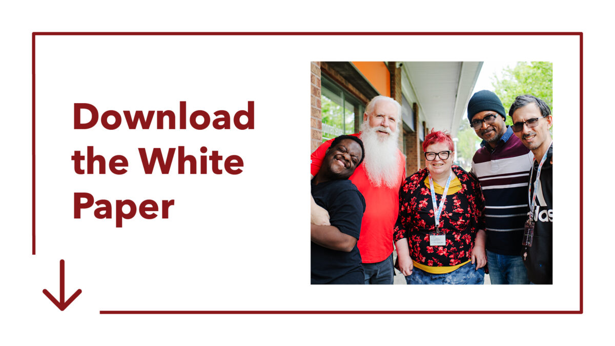 An icon that says "Download the White Paper" and a photo from Karis Disability Services programming. 