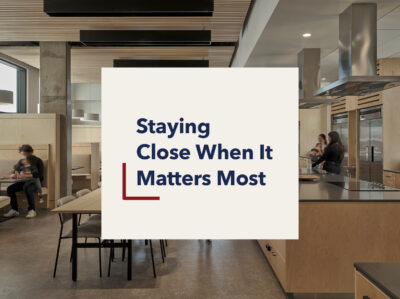 Beige square box with "Staying Close when it Matters Most" text and and image of the Halifax Ronald McDonald House kitchen in the background