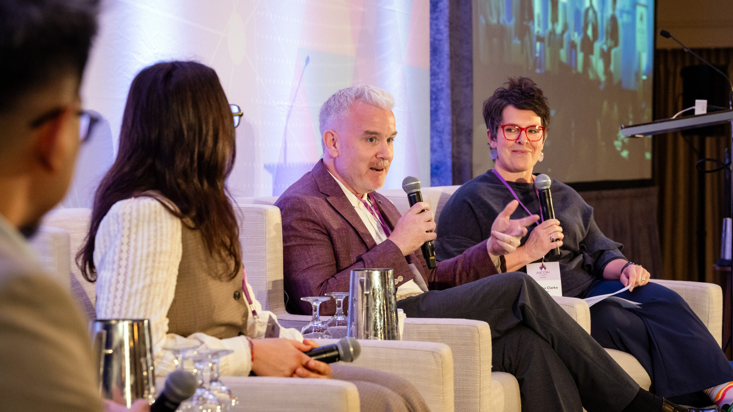A photo of a panel at AICON that was moderated by the author, Natasha Clarke